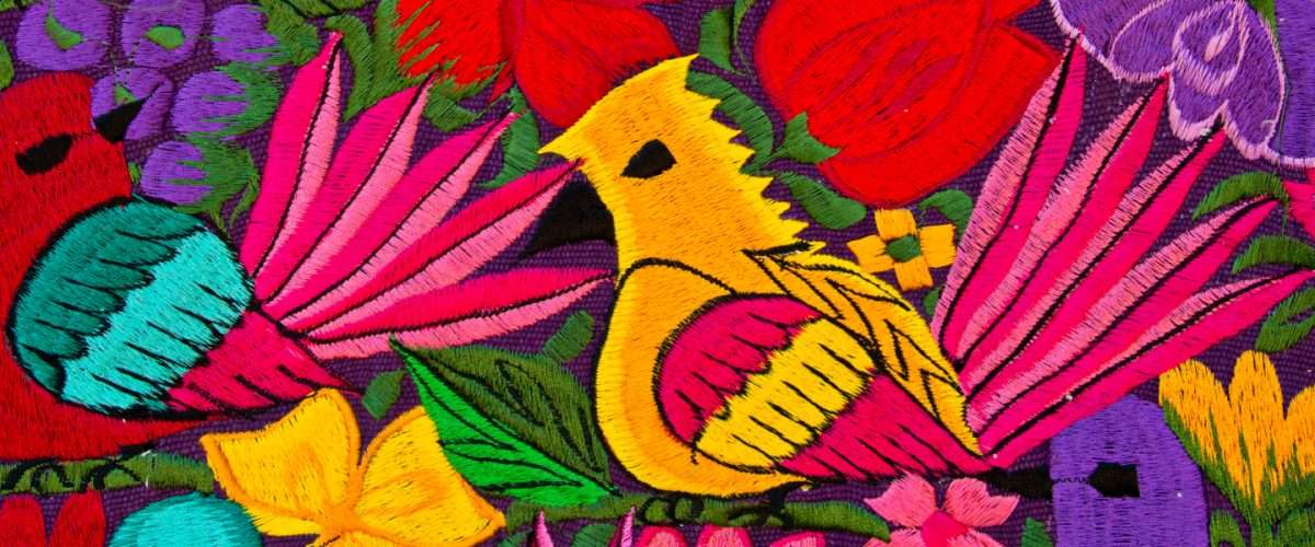 Textile background showing traditional Oaxacan weaving